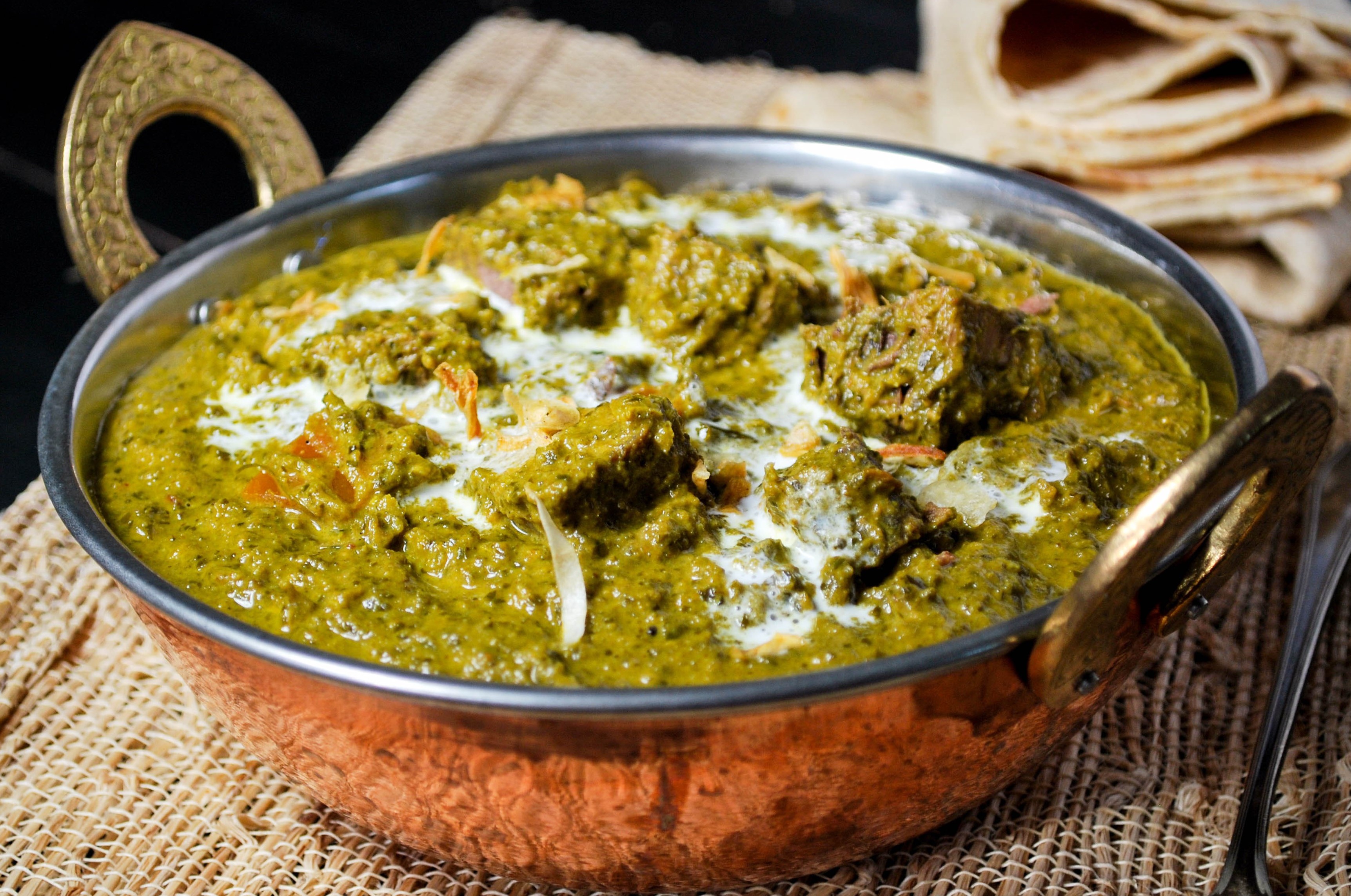 Lamb cooked in a delicately spiced spinach gravy